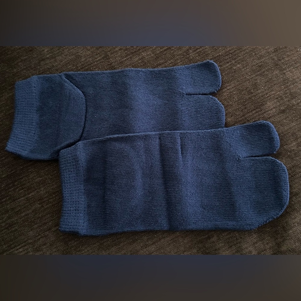 Nib airline socks like maison margiela tabi socks.  Oh so comfy!